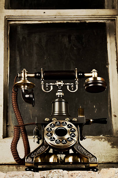 istock Retro Phone - Vintage Telephone by Old Grunge Window 465416651