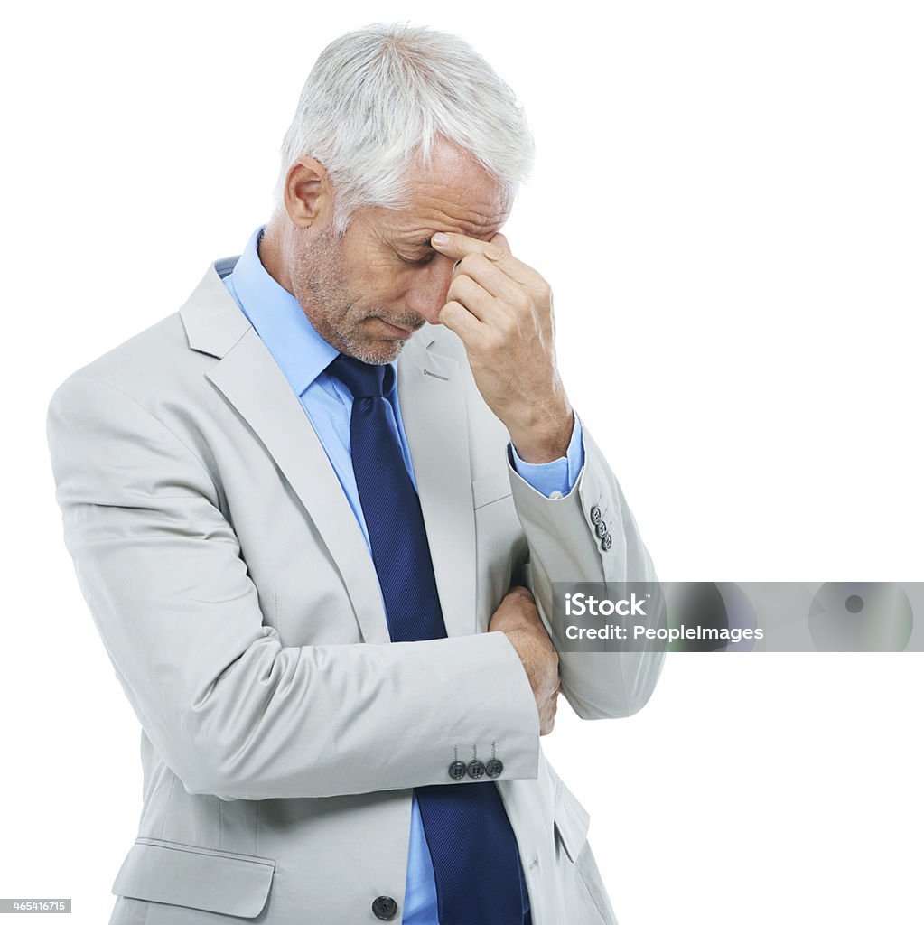 Work is stressing him out! Studio shot of a frustrated-looking mature businessman isolated on white 50-54 Years Stock Photo