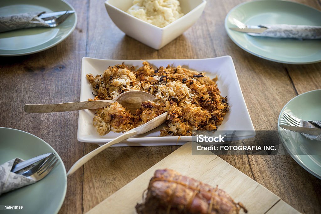 Cabbage with Pork Dinner Side dish of Cabbage on family dinner table. Autumn Stock Photo