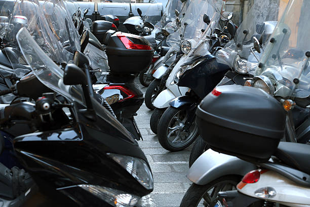 istock scooters and mopeds parked in illegal parking 465421396