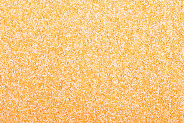 istock Crude corn grits on the board diet food 465424342