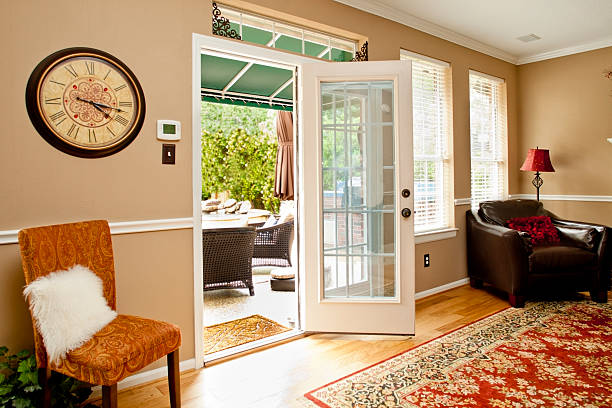 istock Home Interiors: Living room with back door open to patio. 465425393