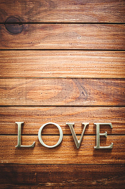 istock Love text on rustic vintage plank for st. valentine 465425863