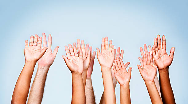 istock I'll do it! Eleven hands raised to volunteer or respond 465426161