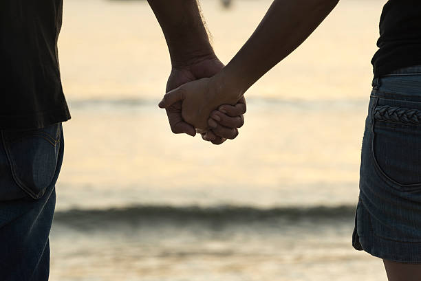 istock Young girl holding hands 465431718
