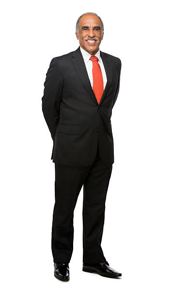 Latin business executive with hands behind him