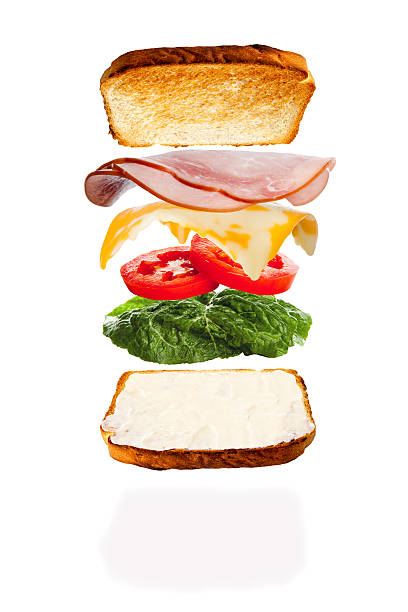 Putting Together a Cheese and Ham Sandwich