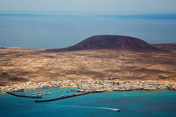 istock harbor rock stone sky  spain graciosa miramar del rio 465435379