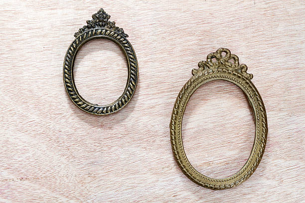 istock Vintage Metal frames on the board. 465435732