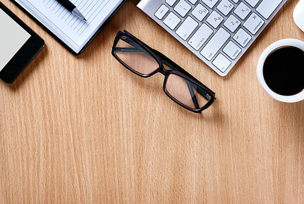 istock Eye Glasses on Businessman Table 465436094