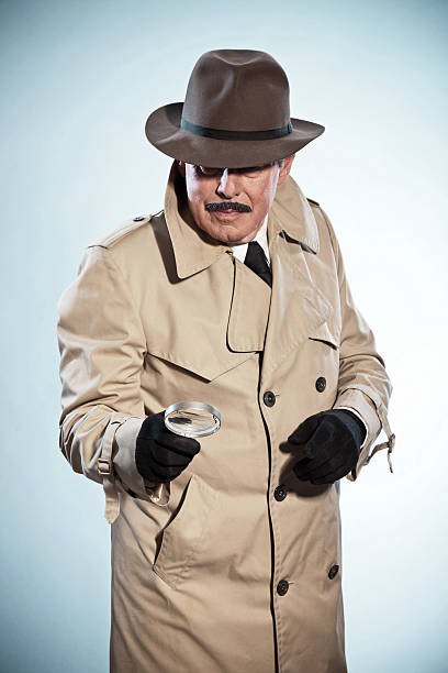 istock Retro detective man with mustache and hat. Holding magnifying glass. 465436271