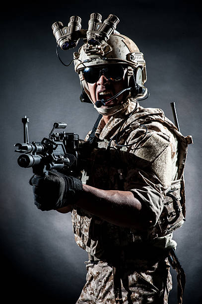 istock soldier man hold Machine gun style fashion 465436563
