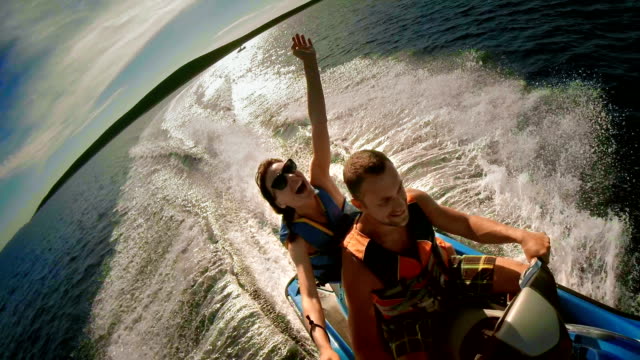 POV Couple Having Fun Riding A Jet Boat