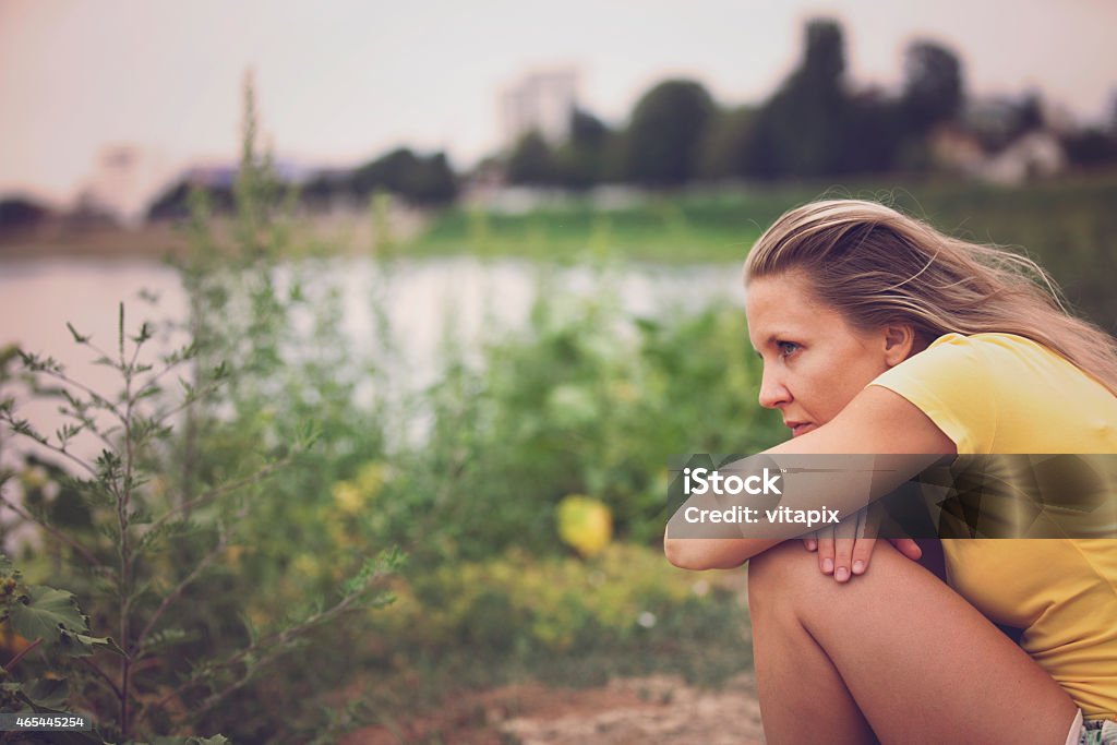 Contemplating woman outdoor portrait 2015 Stock Photo