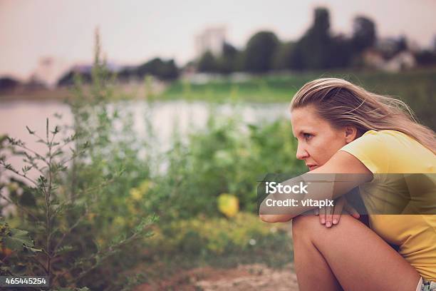 Contemplating Woman Outdoor Portrait Stock Photo - Download Image Now - 2015, 25-29 Years, 30-39 Years