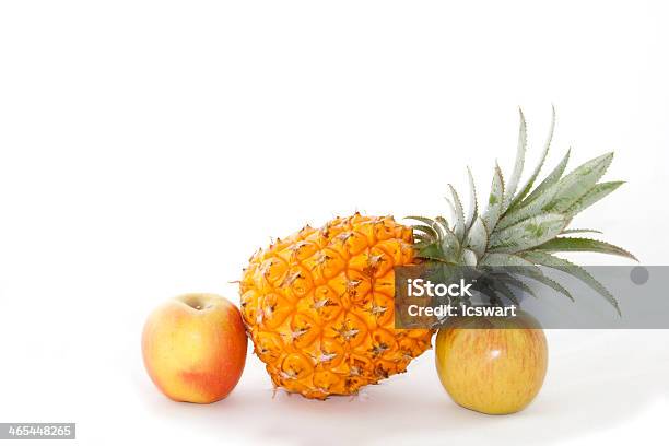 Display Of Two Shiny Apples And A Pineapply Stock Photo - Download Image Now - Apple - Fruit, Decoration, Dieting