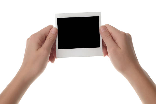 istock instant photo in hands 465451997