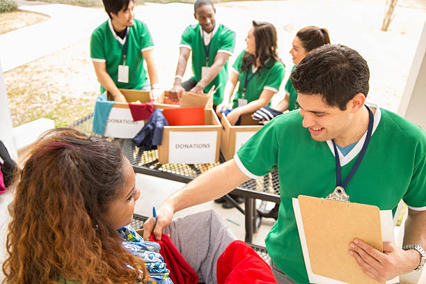 istock Volunteers: College students collect clothing donations for needy. 465452905