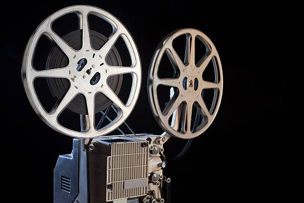 istock Film projection in dark 465455839