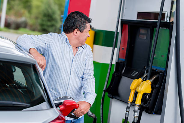istock Man at a gas station 465458359