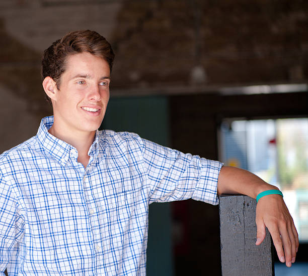 istock Young Man Looking away in warehouse 465458703