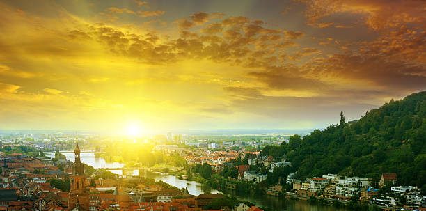 istock city  and sunrise 465462822