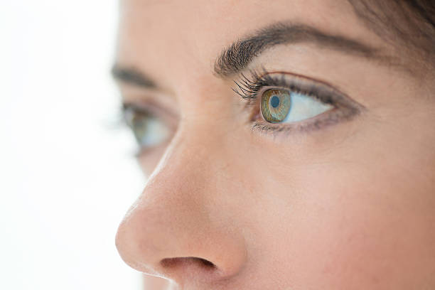 istock close up of her beautiful green eyes 465462889