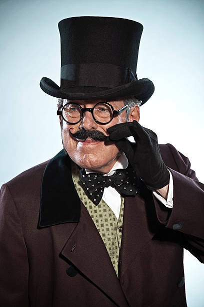 istock Vintage dickens style man with mustache and hat. Wearing glasses. 465464155