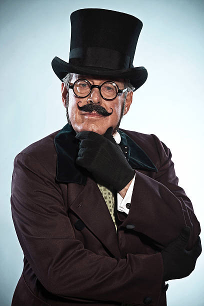 istock Vintage dickens style man with mustache and hat. Wearing glasses. 465464157