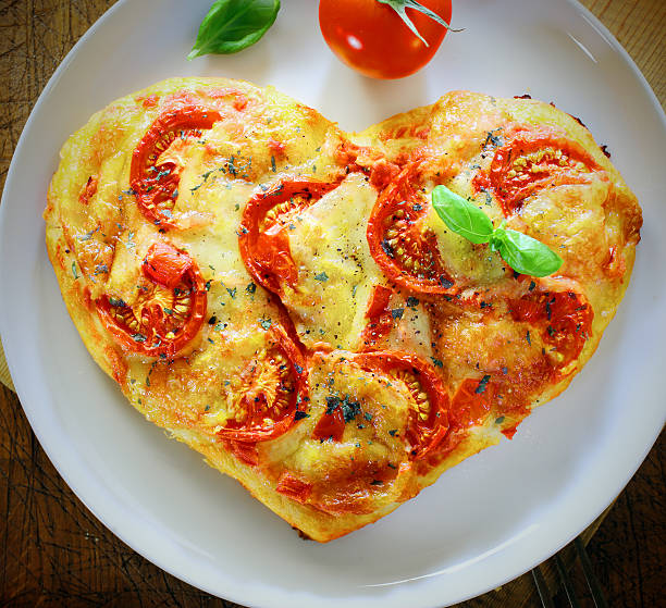 istock Romantic heart shaped Italian pizza 465464417