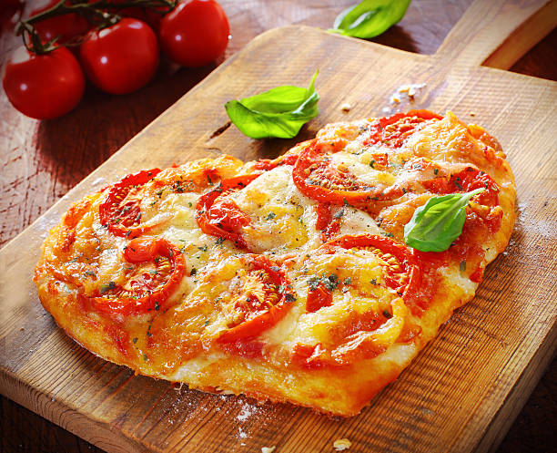istock Heart shaped vegetarian pizza 465464481