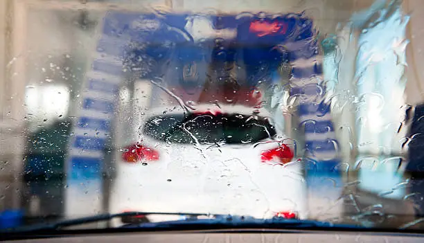View of automatic car wash from inside a car