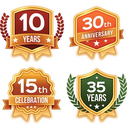 Celebration and award badge and ribbon designs. Text can easily be removed to include your own information. EPS 10 file. Transparency effects used on highlight elements.