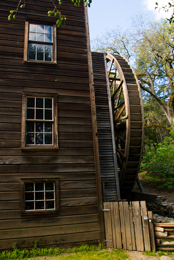 Closeup Bale Grist Mill Water wheel and rustic building Calistoga California