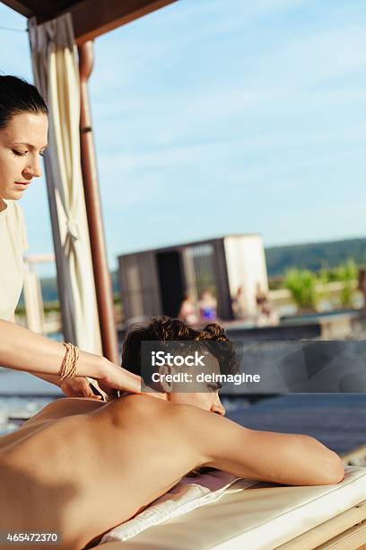 Man During A Massage In The Spa Stock Photo - Download Image Now - 20-24 Years, 20-29 Years, 2015