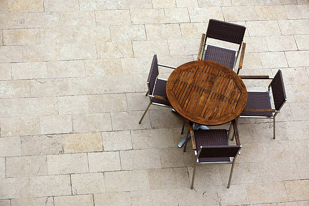 istock Outdoor summer cafe tables with chairs 465473050