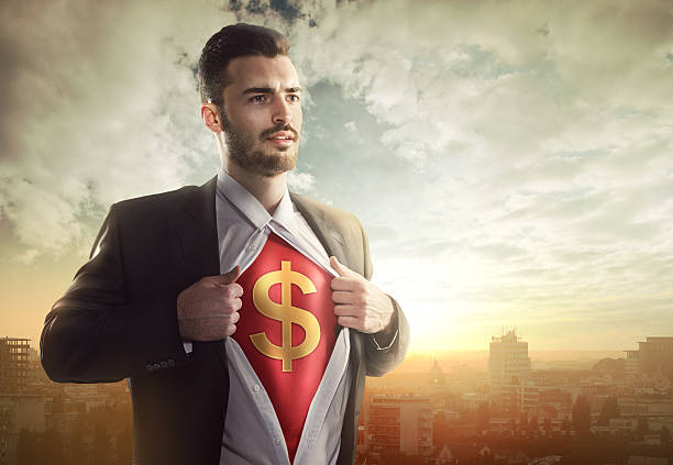 empresário com o símbolo do dólar como super-herói - superhero currency heroes savings - fotografias e filmes do acervo