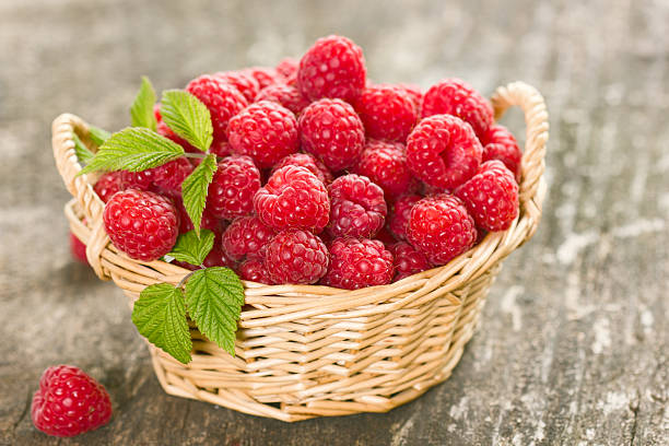 istock Healthy and fresh raspberries in the basket 465474540