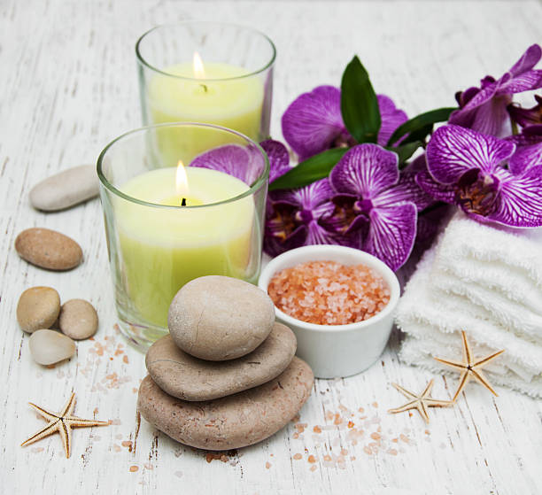 istock Candles, orcids and towels 465475108