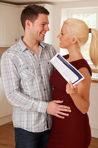 istock Young Couple With House Details In Kitchen 465477095