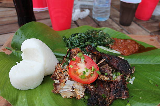 Sadza, vegetables and guinea fowl.