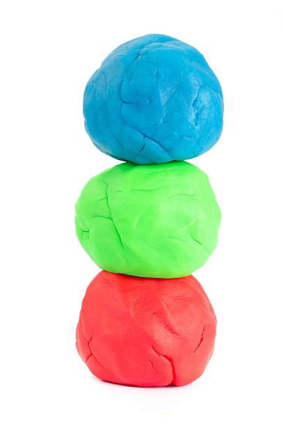 istock Three balls of play doh 465477154