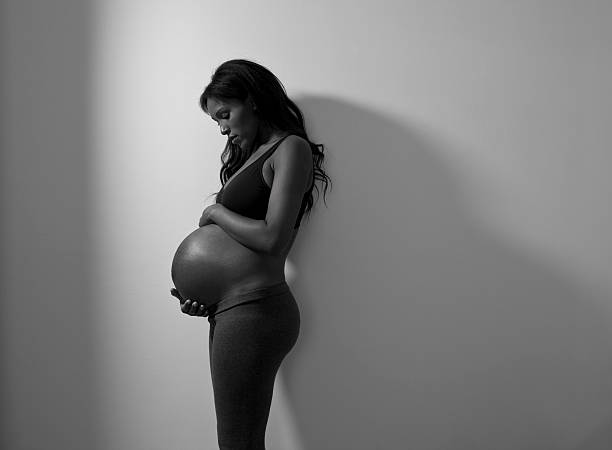 istock Pregnant woman and shadows. 465479187