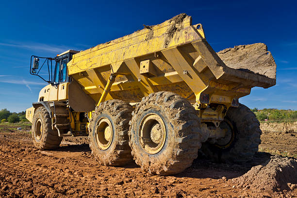 istock Large dump truck in a road construction 465479969