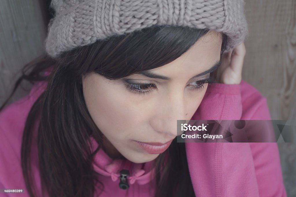 Portrait of young woman looking down and lonely 18-19 Years Stock Photo