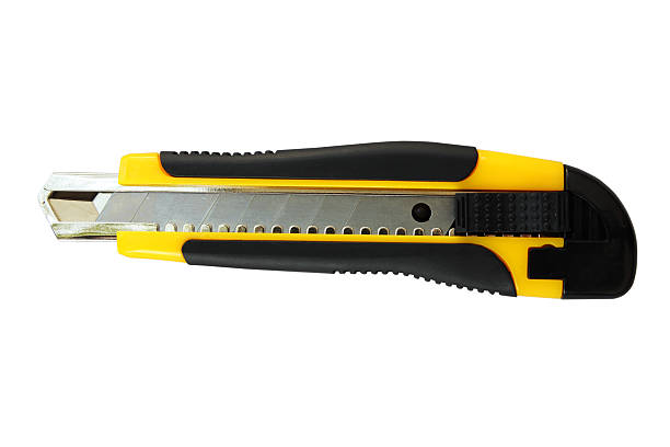 istock Yellow paper cutter isolated on white background 465480752
