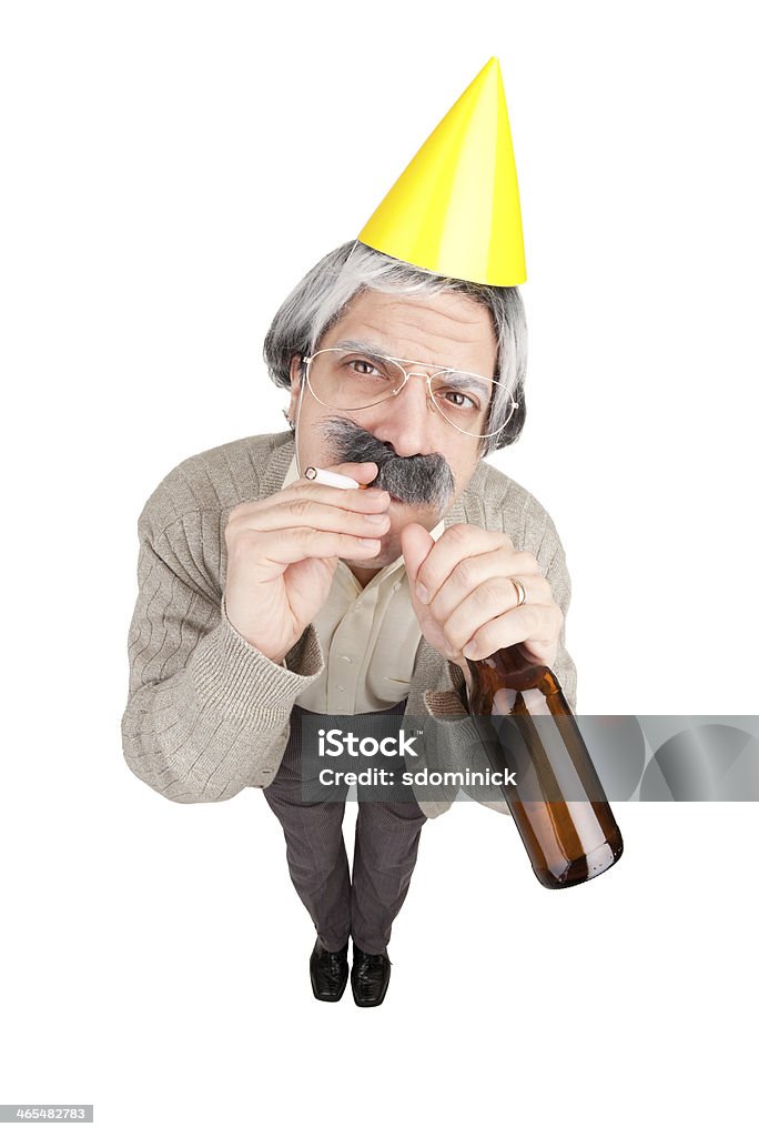 Partying Grandpa A fisheye image of an old man wearing a party hat, smoking a cigarette and drinking a beer. Active Seniors Stock Photo