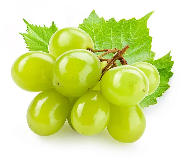 Photo of Green grape with leaf isolated on white background