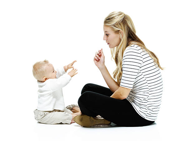 istock Mother feeding her baby 465483643