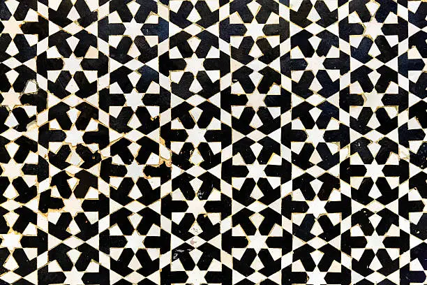 Arabic mosaic inside medina of  Fes. Morocco, West Africa. Fez is the second largest city of Morocco, and is a UNESCO World Heritage Site. The city has been called the "Mecca of the West" and the "Athens of Africa".http://bem.2be.pl/IS/morocco_380.jpg